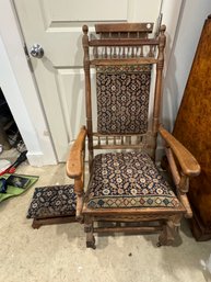 ANTIQUE PLATFORM ROCKER W/ PERSIAN RUG UPHOLSTERY AND MATCHING STOOL