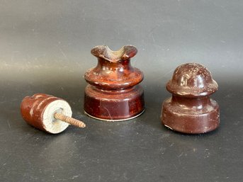 A Trio Of Vintage Insulators In Brown Ceramic