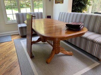 American Solid Oak Dining Table With Spindle Double Pedestal Base ( Comes With 2 Leaves  And Storage Bags )