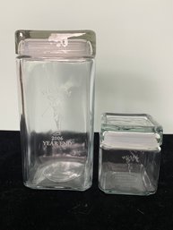 Pair Of Golf Themed Glass Cannisters