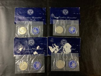 4 - 1971 IKE UNC Silver Dollars In Cello, Envelope Scared (40 Percent Silver)