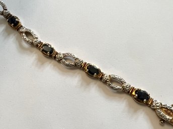 GOLD OVER STERLING SILVER TWO TONE BLUE SAPPHIRE BRACELET