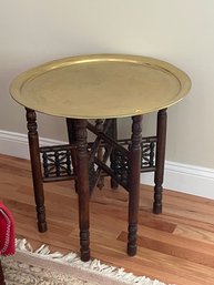 A PERSIAN BRASS TABLE ON STAND