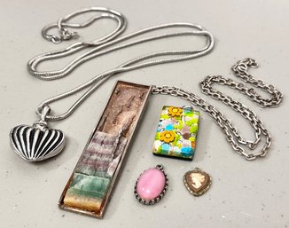 An Assortment Of Silver And Stoned Jewelry