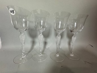 A SET OF FOUR FABERGE FIGURAL WINE GLASSES