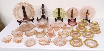 A Table Lot Of Mostly Pink Depression Glass In Various Patterns