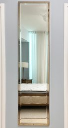 A Modern Riveted Chrome Framed Full Length Mirror By Restoration Hardware