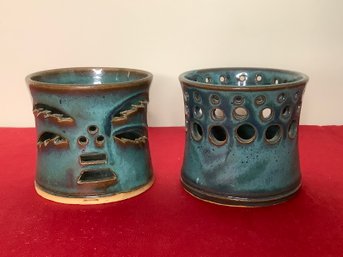 PAIR OF BLUE GLAZED POTTERY CANDLE VOTIVES