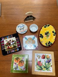 Collection Of Ceramic Trivets And An Ulu From Alaska