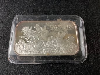 1994 One Ounce Silver Bar Marked ' Easter ' Enclosed In Plastic