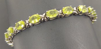 VINTAGE STERLING SILVER PERIDOT TENNIS BRACELET