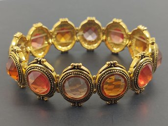 VINTAGE SIGNED JOAN RIVERS GOLD TONE FACETED FAUX STONE STRETCH BRACELET