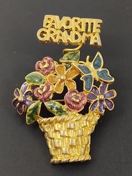 VINTAGE GOLD TONE ENAMEL FAVORITE GRANDMA FLOWER BASKET BROOCH