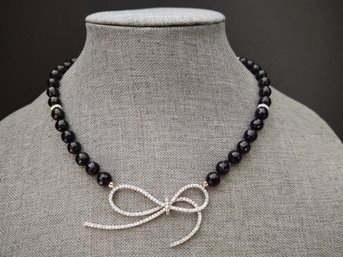 VINTAGE STERLING SILVER FACETED ONYX BEADED NECKLACE WITH CZ BOW PENDANT