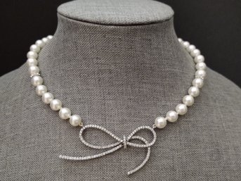 VINTAGE STERLING SILVER FAUX PEARL BEADED NECKLACE WITH CZ BOW PENDANT