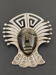 VINTAGE MEXICAN STERLING SILVER CARVED HAWKEYE STONE FACE AZTEC WARRIOR BROOCH / PENDANT