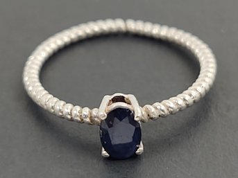PRETTY STERLING SILVER THIN TWISTED &  BLUE SAPPHIRE RING