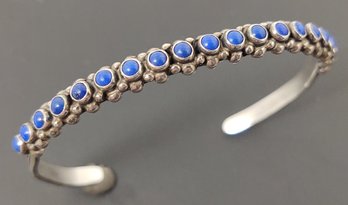ANGLO - NATIVE AMERICAN LEO FEENEY STERLING SILVER LAPIS CUFF BRACELET