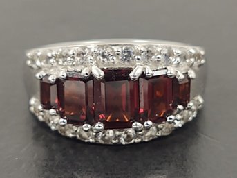 STERLING SILVER GARNET & WHITE TOPAZ RING