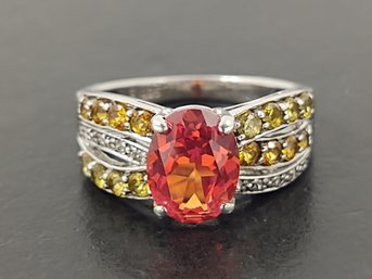 ABSOLUTELY MAGNIFICENT STERLING SILVER ORANGE SAPPHIRE DIAMOND & TOPAZ RING