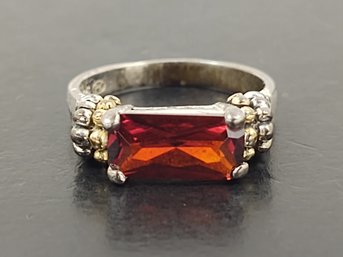 STERLING SILVER GARNET RING W/ GOLD ACCENTS