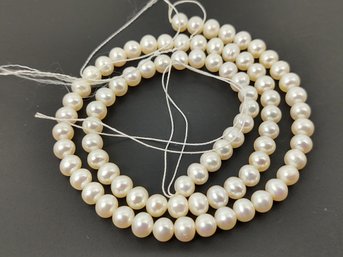 STRAND OF LOOSE ROUND CULTURED PEARLS