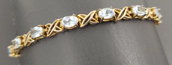 VINTAGE GOLD OVER STERLING SILVER BLUE TOPAZ HUGS & KISSES BRACELET