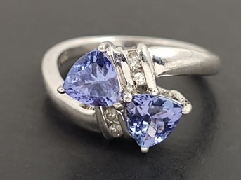 STUNNING STERLING SILVER TANZANITE & DIAMOND BYPASS RING