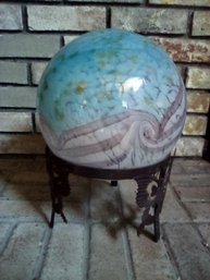 Glass Art Sphere On Decorative Metal Stand Is A Beautiful Accent Piece