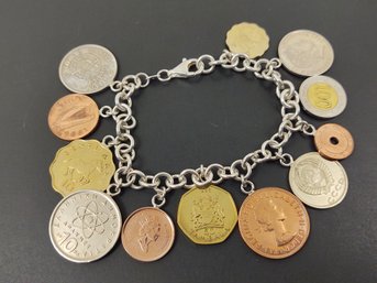 STERLING SILVER BRACELET WITH FOREIGN COINS CHARM BRACELET