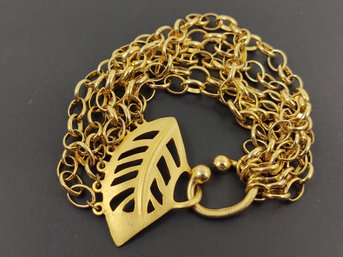 DESIGNER SIGNED DIANE VON FURSTENBERG GOLD TONE MULTI STRAND LEAF BRACELET