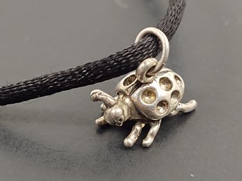 STERLING SILVER SILK LADYBUG PENDANT ON LACE NECKLACE