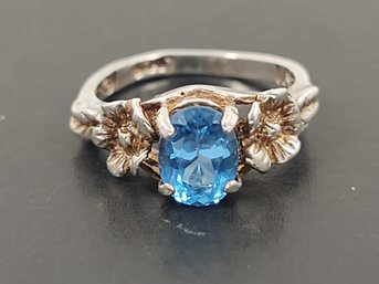 STERLING SILVER BLUE TOPAZ FLOWER RING