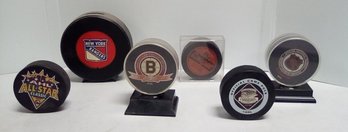 5 Vintage Hockey Pucks, 1 Signed, Plus A New York Rangers Hockey Puck Bank  LP/C5