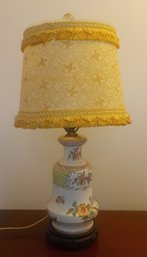 Beautiful Antique Ceramic Bodied Lamp With Lovely Fringed Shade.