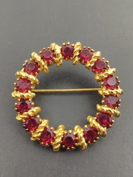 VINTAGE RED RHINESTONE CIRCLE BROOCH