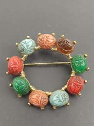 VINTAGE MULTI COLORED SCARAB CIRCLE BROOCH