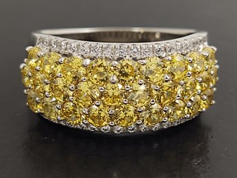 STUNNING STERLING SILVER YELLOW CZ ROWS RING