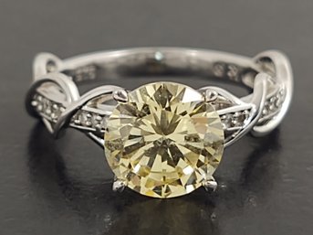 STUNNING STERLING SILVER YELLOW CZ RING
