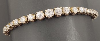 BEAUTIFUL GOLD OVER STERLING SILVER GRADUATED CZ TENNIS BRACELET