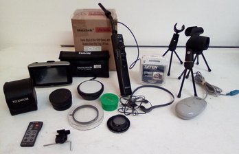 Various Lenses, Tripod Handle, DVD Cases, Microphone Stands, Magellan GPS, Video 8 Remote, Mouse & Headphones