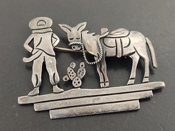 VINTAGE MEXICAN DESIGNER MARICELA STERLING SILVER MAN WITH DONKEY BROOCH