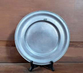 Vintage/antique Pewter Plate With Black Stand. Marked.
