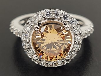 BEAUTIFUL STERLING SILVER CHAMPAIGN COLORED CZ HALO RING