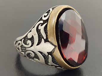 VINTAGE PERSIAN STYLE STERLING SILVER FACTED GARNET RING