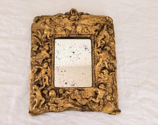 Small Antiqued Mirror With Very Ornate Frame