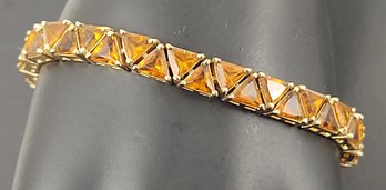 BEAUTIFUL GOLD OVER STERLING SILVER ORANGE TRIANGLE CZ BRACELET