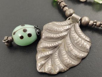 VINTAGE STERLING SILVER MILLEFIORI GLASS LADY BUG LEAF NECKLACE