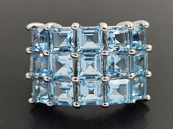 STUNNING STERLING SILVER THREE ROWS BLUE TOPAZ RING