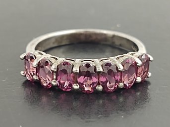 BEAUTIFUL STERLING SILVER 7 STONE GARNET RING